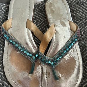 Rhinestone flip flops.